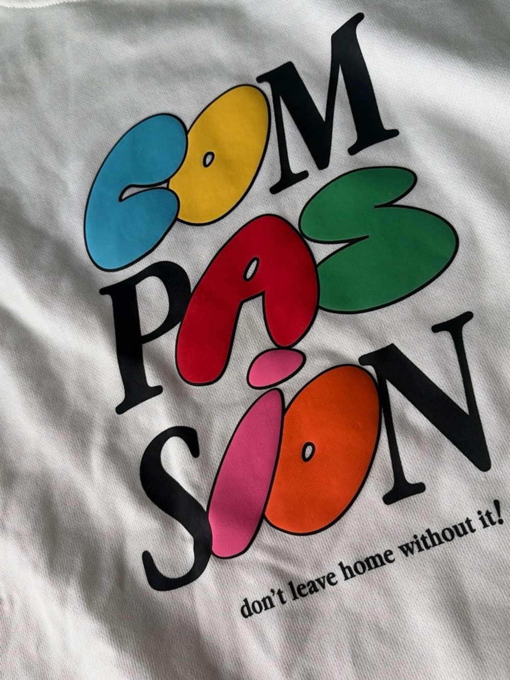 Mayfair White Graphic Men’s Sweatshirt with Colorful 'COMPASSION' Print - Picture 2 of 4
